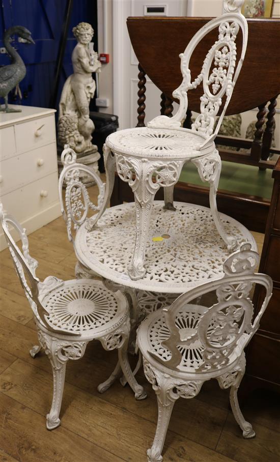 A garden table and four chairs W.73cm